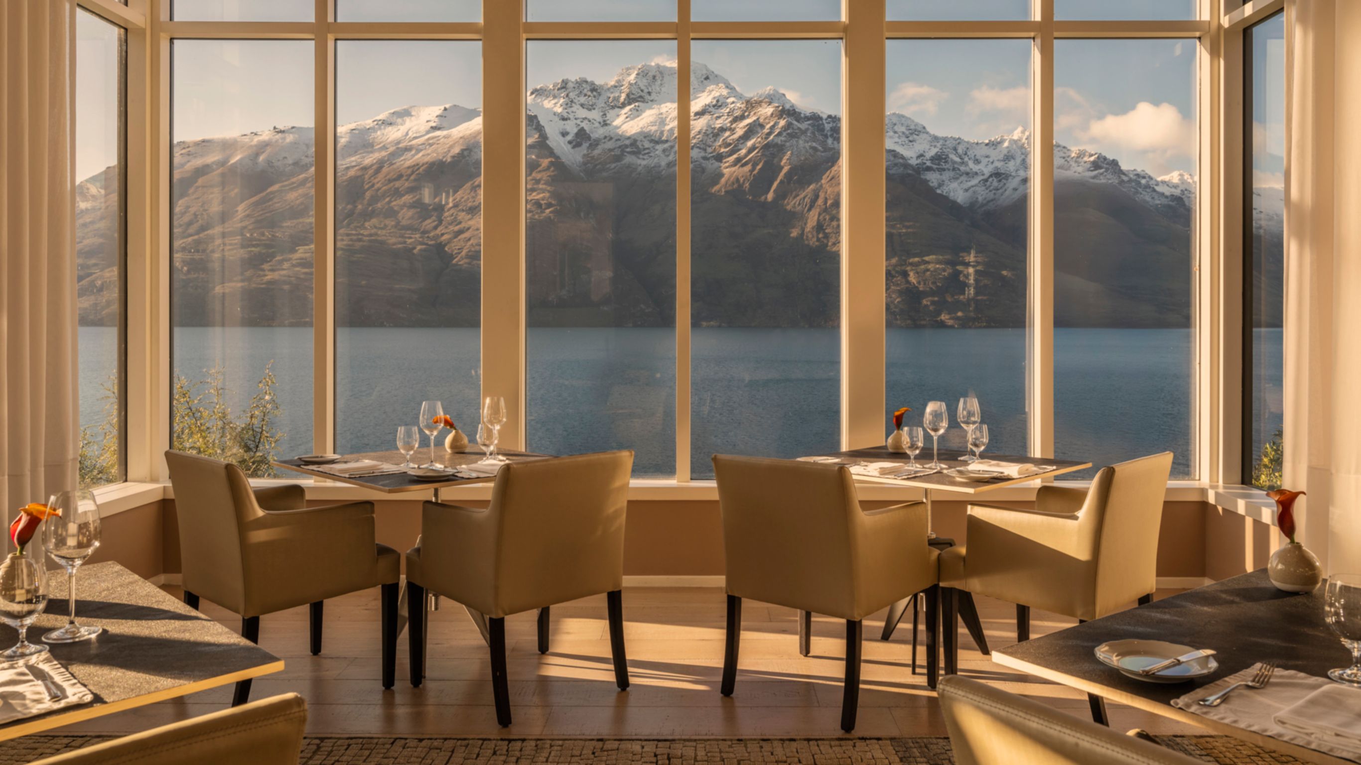 Main Lodge Main Dining Room with lake and mountains view